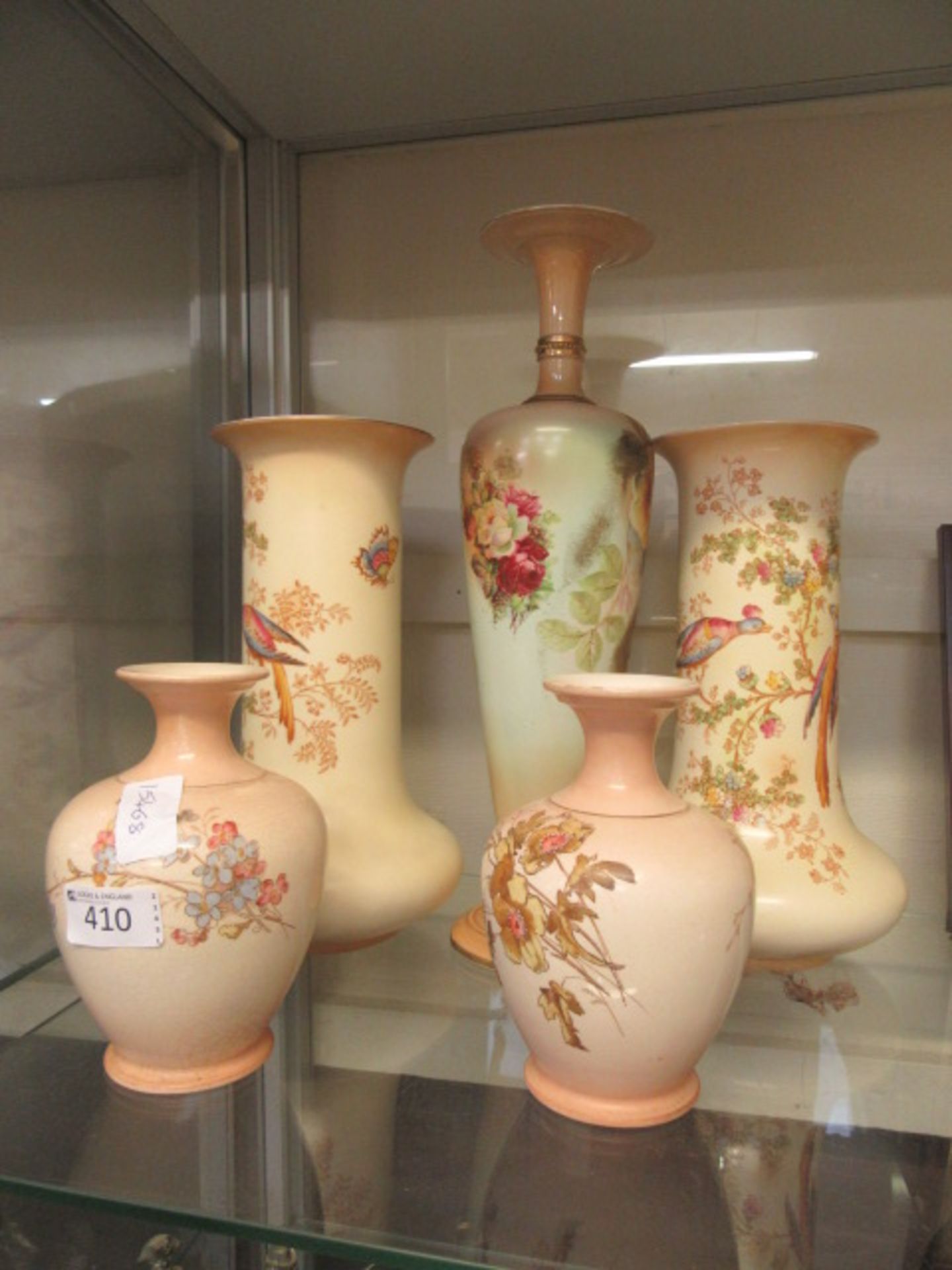 A selection of early 20th century blush ivory vases to include two pairs and one single