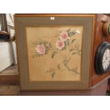 A framed and glazed oriental painting on silk of roses