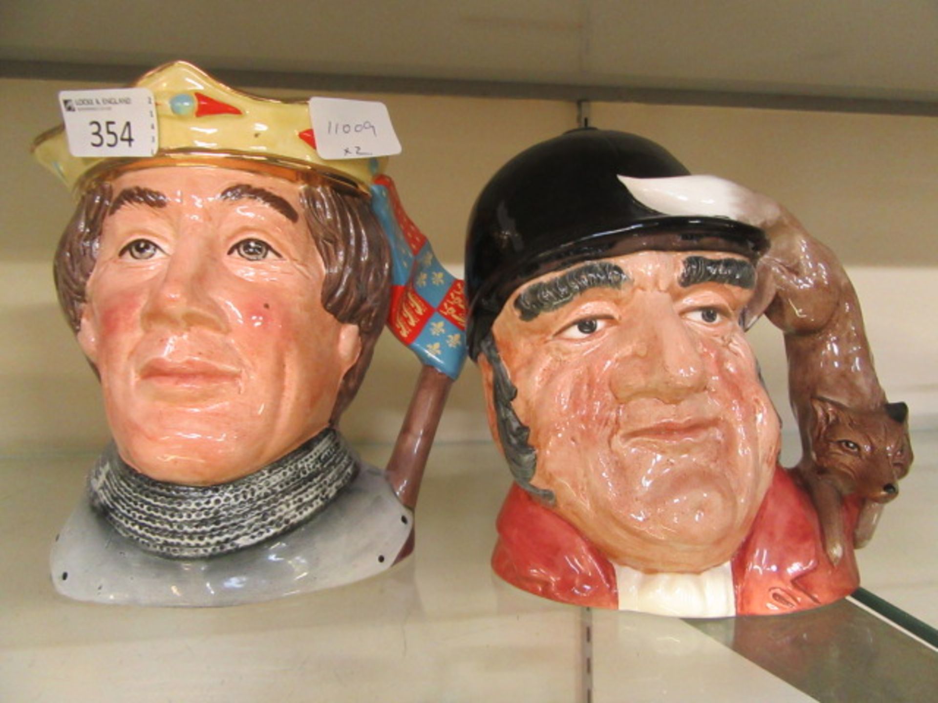 Two Royal Doulton character jugs 'Gone Away' D6531 together with 'Henry V' character jug