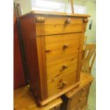 A modern pine four drawer chest