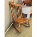 A 19th century alder rocking chair