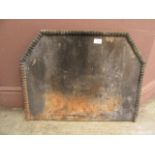 A 19th century cast iron fire back CONDITION REPORT: Dimensions are as follows: H: