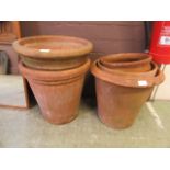 Five terracotta plant pots