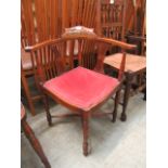 An Edwardian mahogany inlaid corner chair
