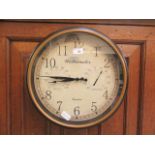 A reproduction Westminster wall clock with humidity and temperature dials