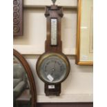 An early 20th century oak banjo barometer