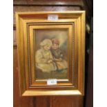 A Continental gilt framed oil on board of two children