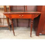 An Edwardian mahogany hall table with single drawer with green leatherette insert to top