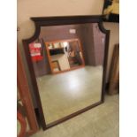 A mahogany framed wall mirror