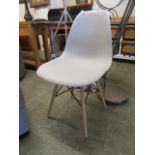 A PVC seated and beech legged chair