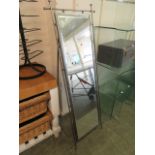 A modern metal framed bevel glass floor standing cheval mirror