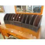 A selection of leather storage stands
