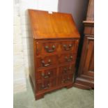 A modern yew wood veneered bureau,