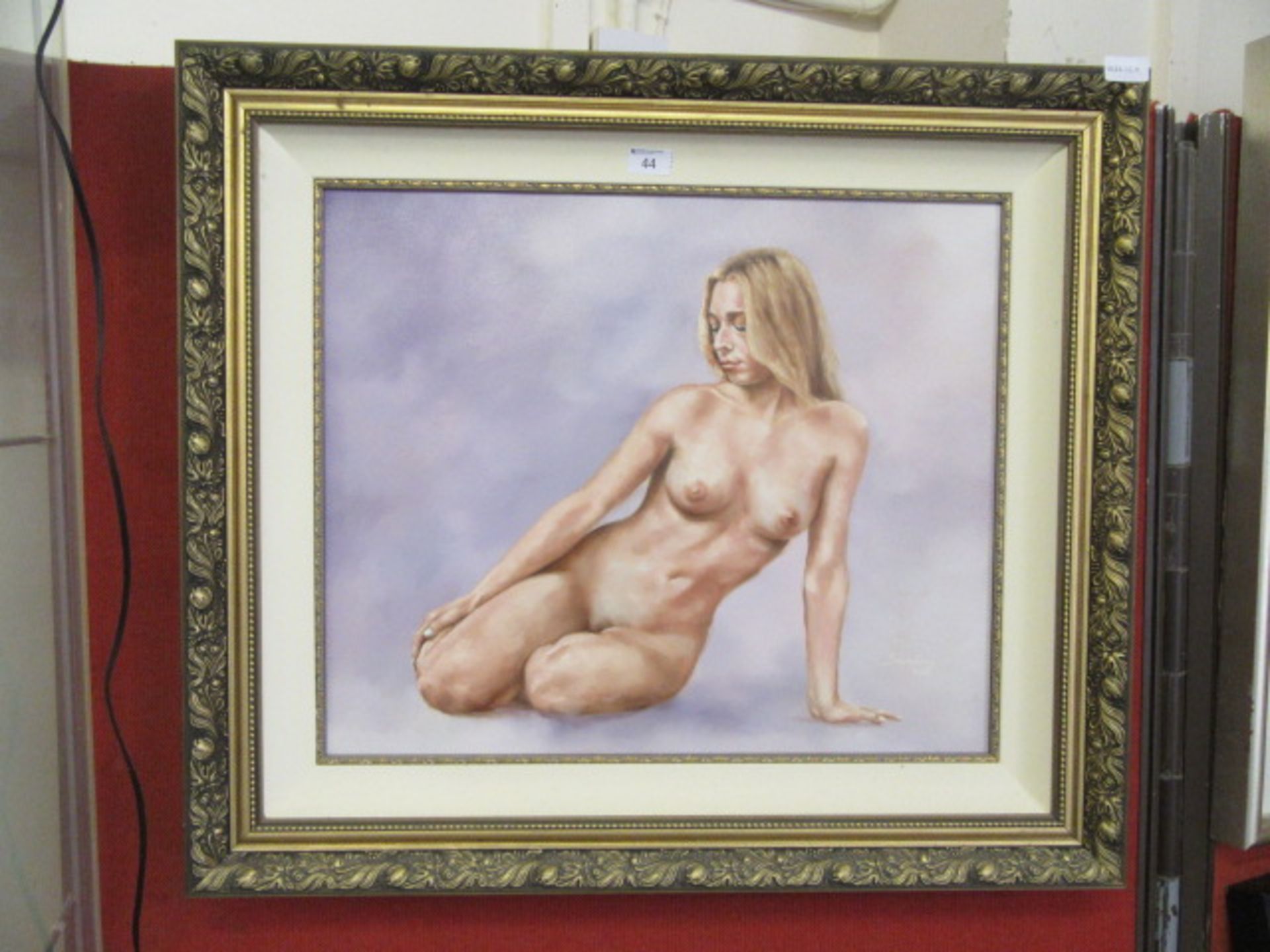 A gilt framed oil on canvas of nude signed Saunders 2001