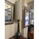 A modern lamp with ceramic column