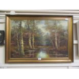 A framed oil on canvas of woodland stream scene signed bottom right