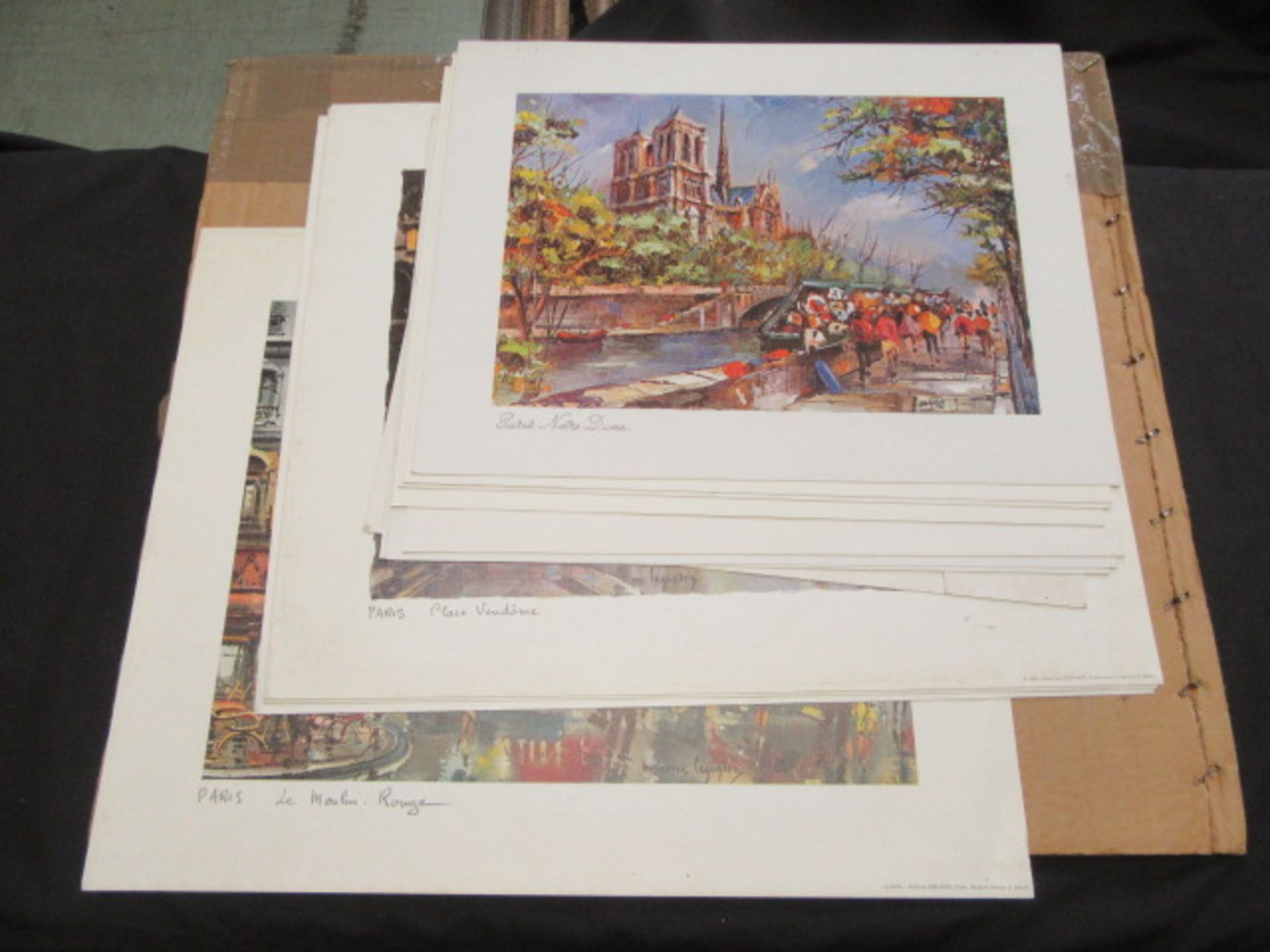 A quantity of unframed Paris prints