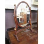 A small mahogany veneered skeleton mirror