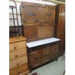 An early 20th century oak kitchen unit 'The Mother Hubbard Deluxe' by 'The Times Furnishing Company