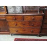 An early Victorian mahogany chest of two short over two long drawers