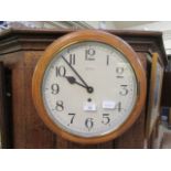 An early 20th century circular wall clock by Bentima