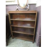 A set of mahogany open bookshelves