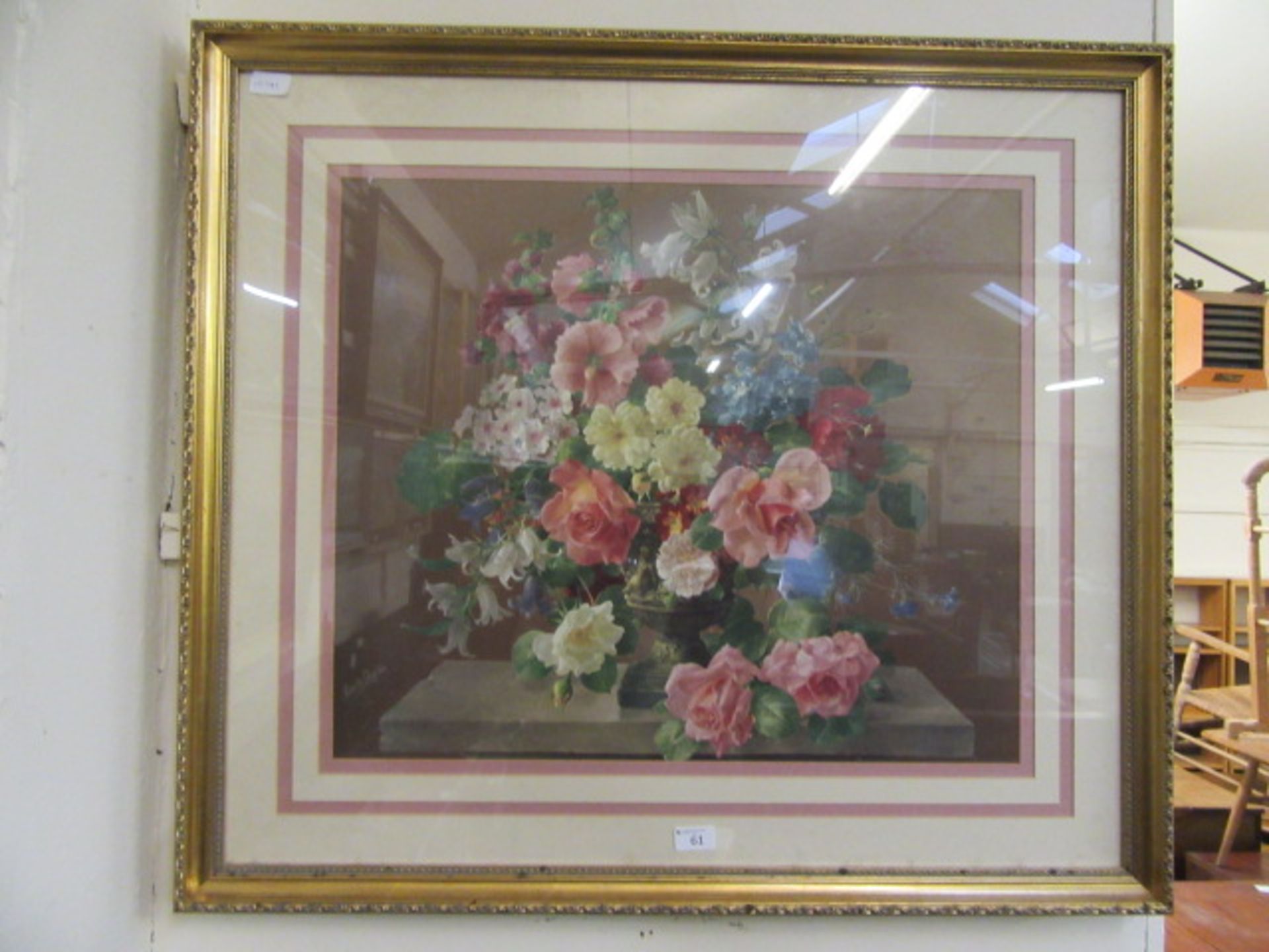 A framed and glazed print of still life