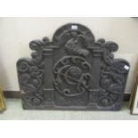 A possible 19th century cast iron fireback with anchor design