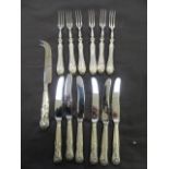 A bag containing silver hallmarked handled cake knives and forks