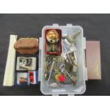 A PVC carton of assorted collectibles to include fan, keys, chains,