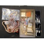 A box containing an assortment of modern costume jewellery