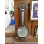 An early 20th century oak banjo barometer