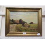 A gilt framed oil on board of countryside scene signed R G Gardner