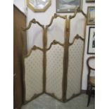 A French style gilt wood three-fold screen with glass top