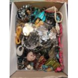 A carton of assorted costume jewellery