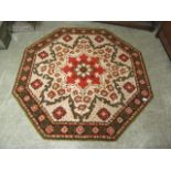 A mid-20th century wool octagonal rug