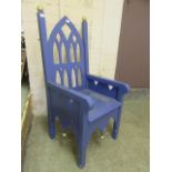 A blue painted gothic style armchair