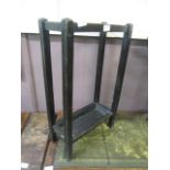 An early 20th century oak stick stand