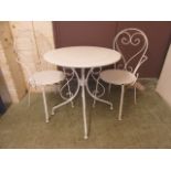 A white painted metal bistro set