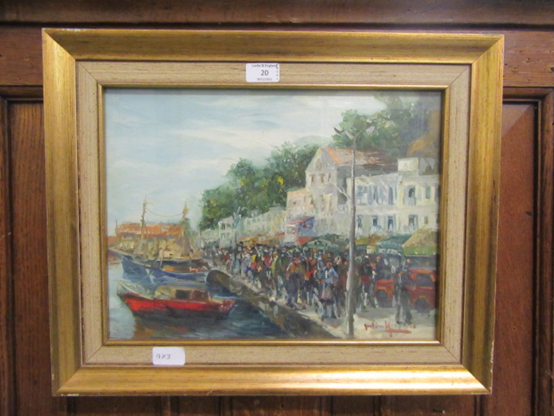 A framed and glazed oil painting of continental harbour scene after Giuliano Marzano