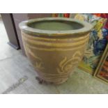 A stoneware garden pot