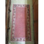 An Eastern pink ground rug