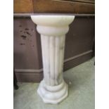 An alabaster pedestal with reeded column CONDITION REPORT: Height 63cm Top 25cm