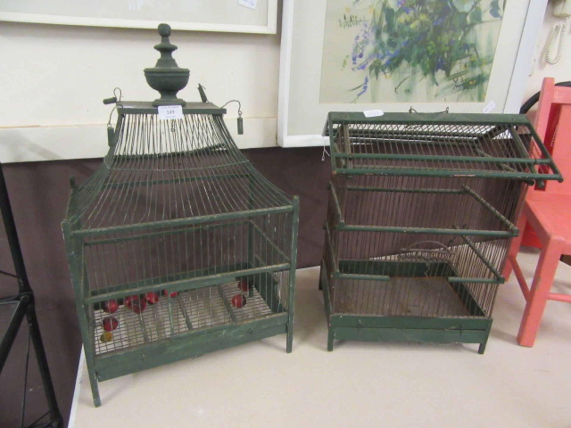 A pair of ornamental bird cages