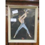 A framed and glazed painting of a man dancing over a shoe
