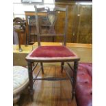 An Edwardian mahogany inlaid hall chair