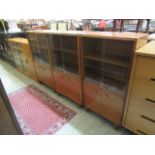 Three mid 20th century teak veneered glazed bookcases