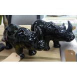 CONTEMPORARY SCHOOL RHINOS, a pair, glazed finish, 24cm H approx. (2)