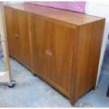 SIDEBOARD, fruitwood with two pairs of cupboard doors with arts and crafts inspired copper