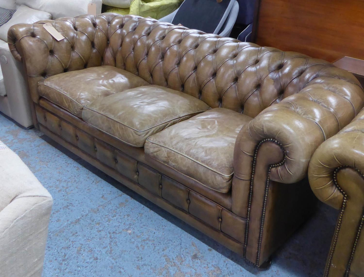 CHESTERFIELD STYLE SOFA, in worn brown buttoned leather, 200cm W x 85cm D x 76cm H.